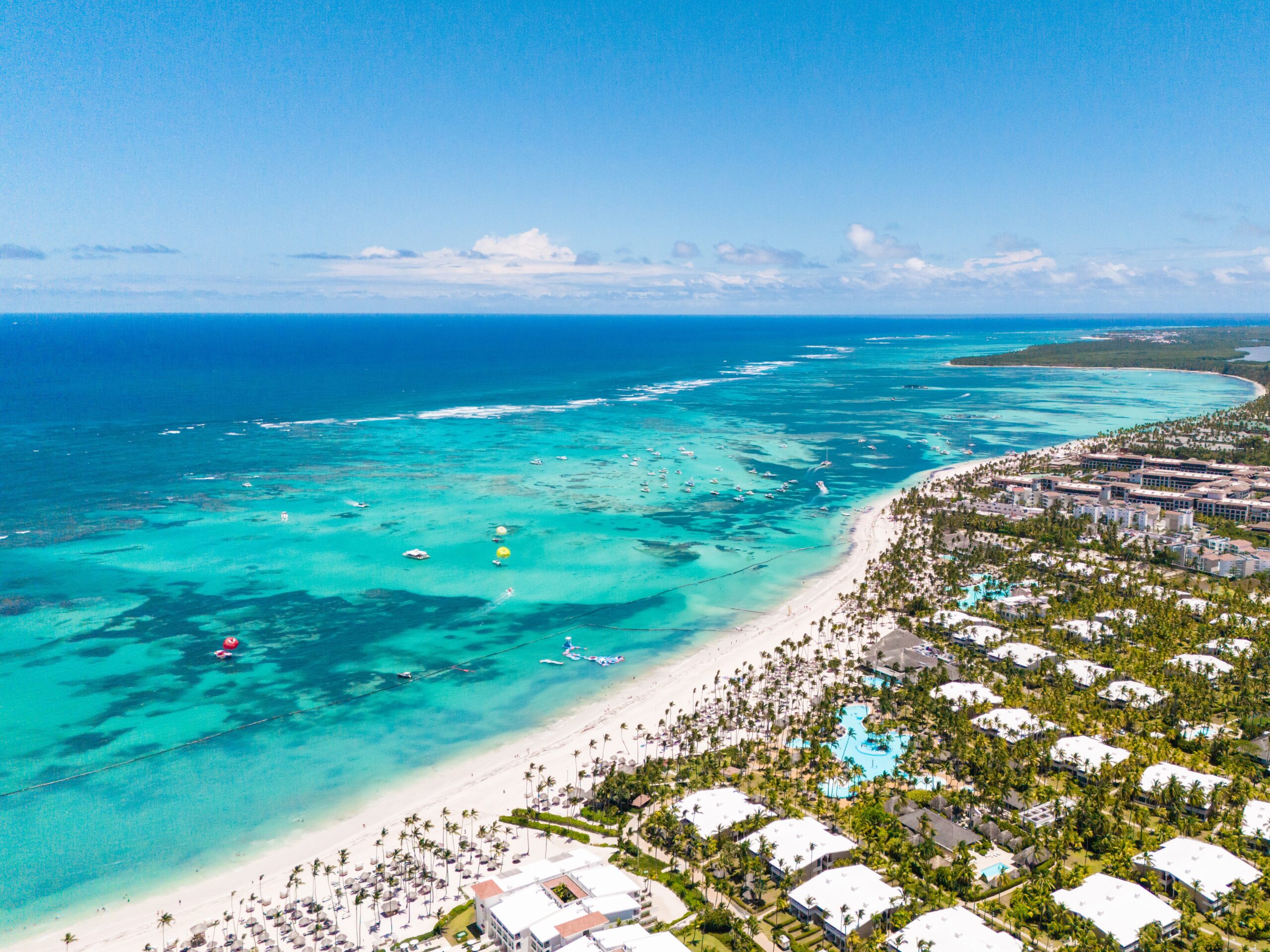 Aerial,View,Of,White,Sand,Beach,With,Many,All,Inclusive